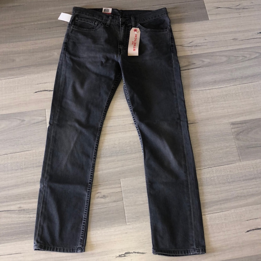 NWT Dark gray Levi’s 511 jeans.